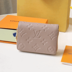 Louis Vuitton Lou Coussin Wallet - Cream 33188 | Sandra Bags